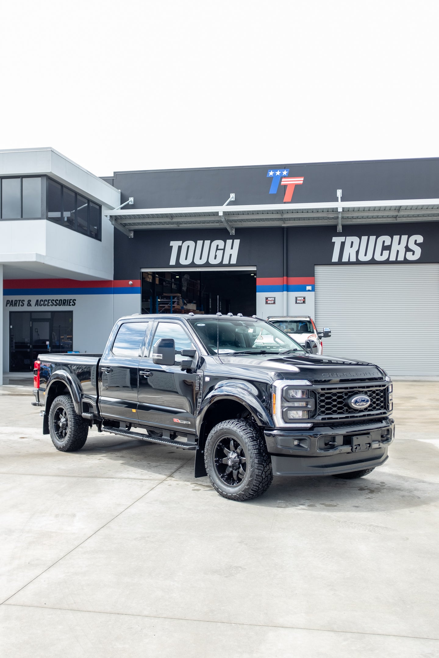 2023 Ford F250 Lariat in Agate Black 'OUTLAW PACKAGE' (STOCK #5017)