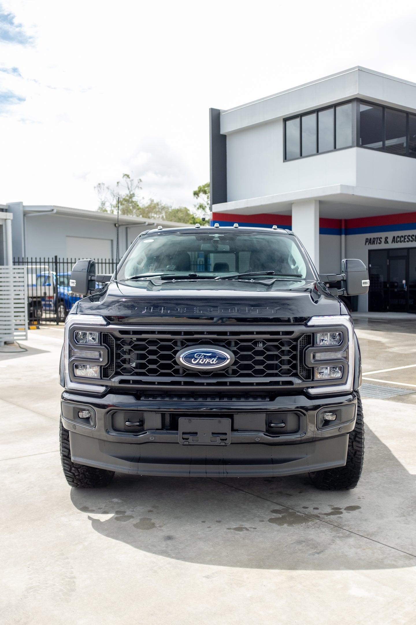 2023 Ford F250 Lariat in Agate Black 'OUTLAW PACKAGE' (STOCK #5017)