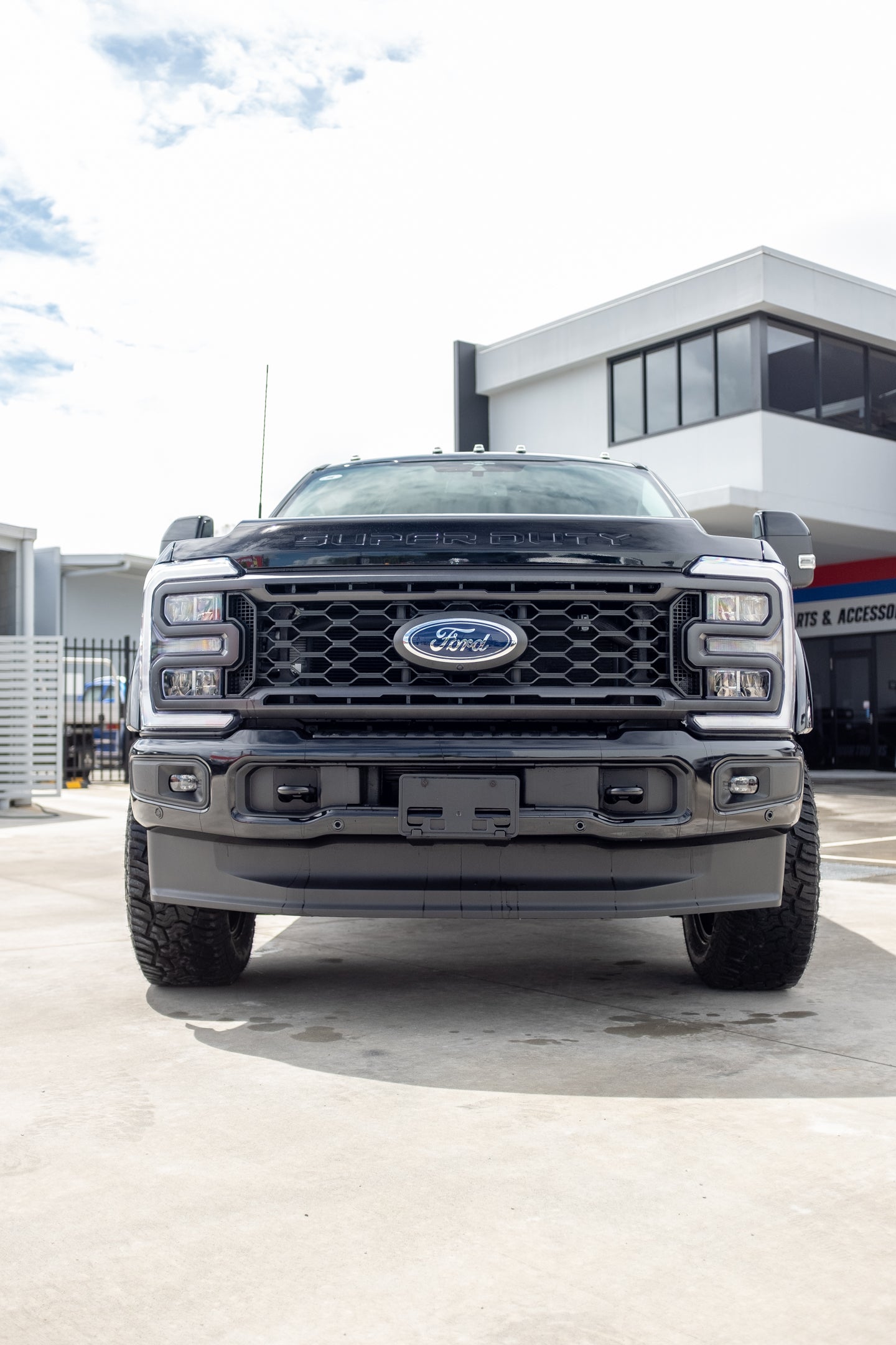 2023 Ford F250 Lariat in Agate Black 'OUTLAW PACKAGE' (STOCK #5017)