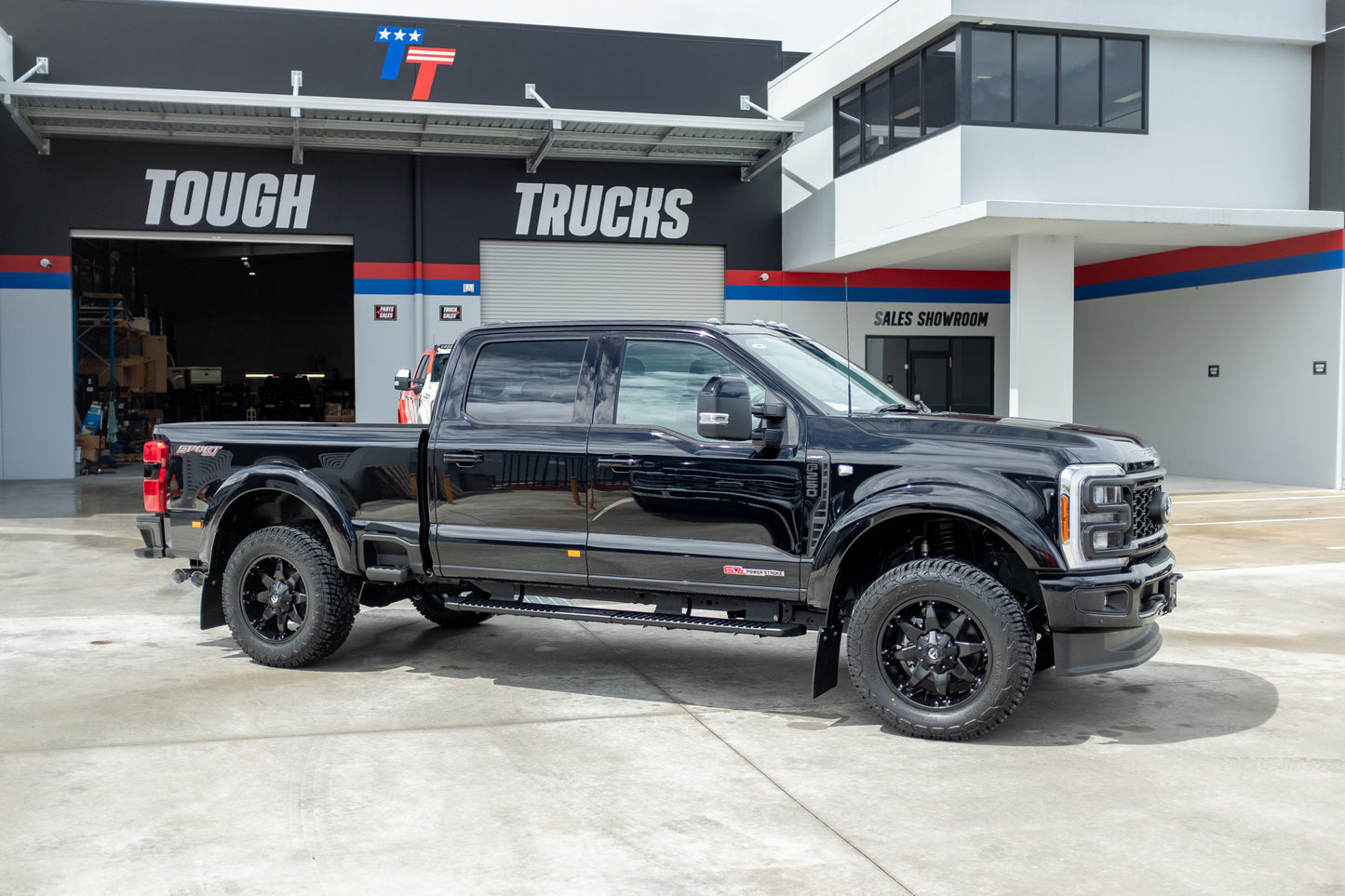 2023 Ford F250 Lariat in Agate Black 'OUTLAW PACKAGE' (STOCK #5017)