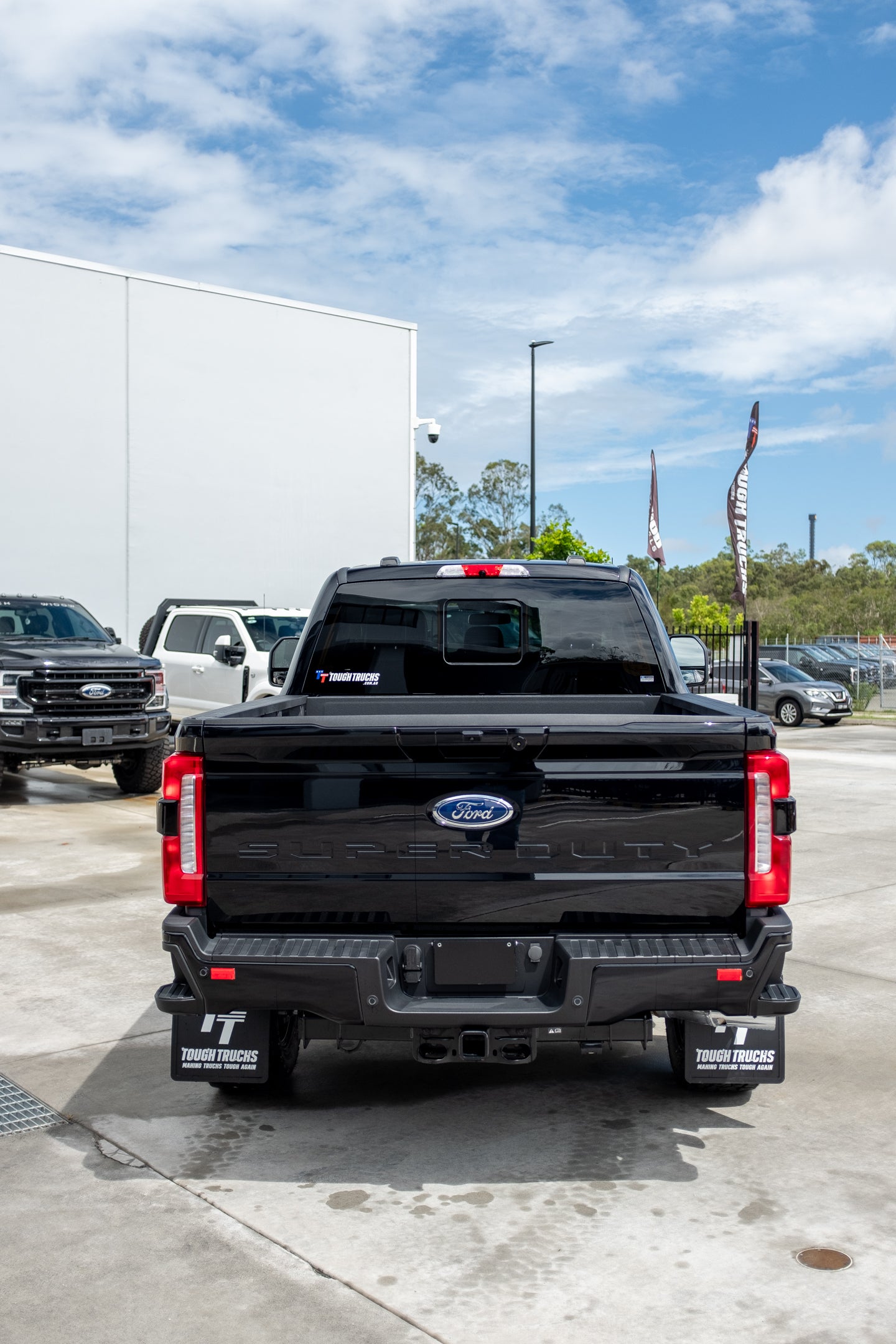 2023 Ford F250 Lariat in Agate Black 'OUTLAW PACKAGE' (STOCK #5017)