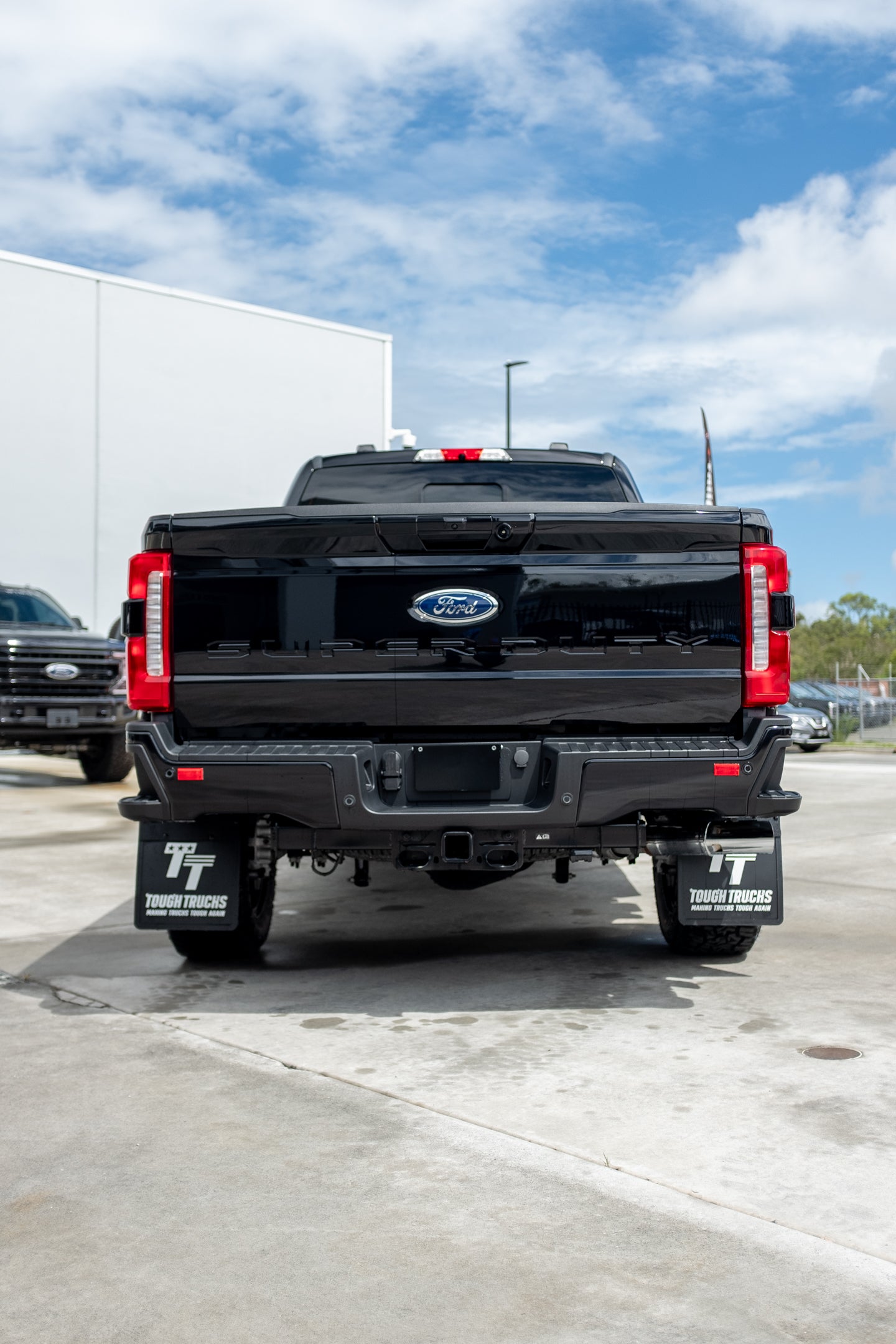 2023 Ford F250 Lariat in Agate Black 'OUTLAW PACKAGE' (STOCK #5017)