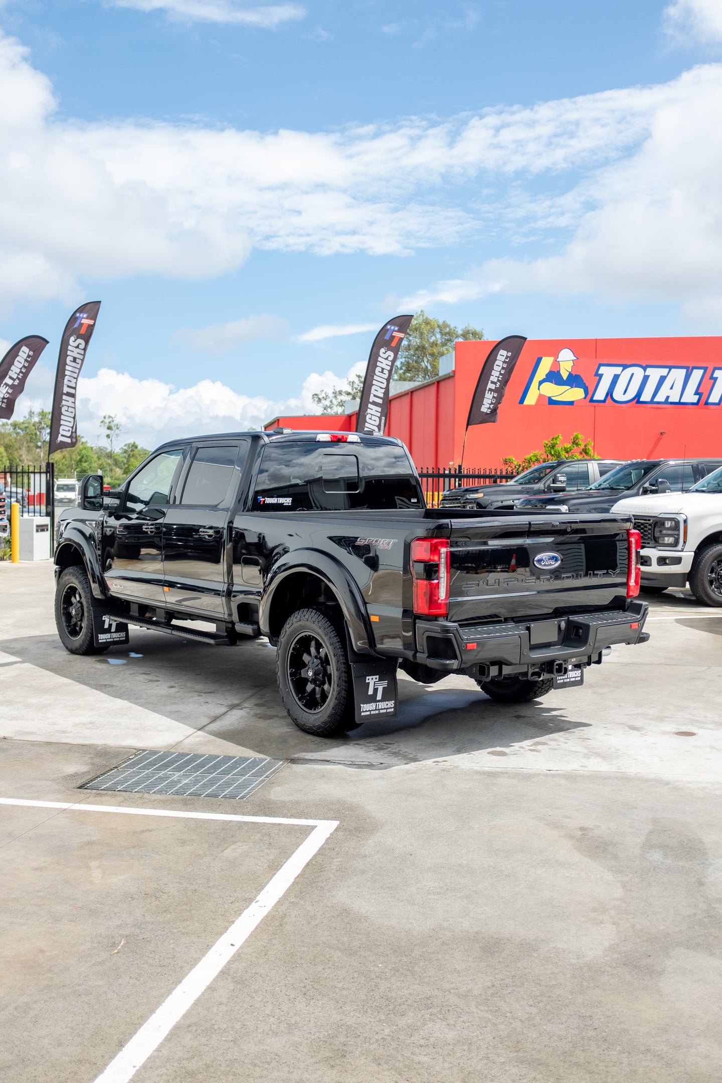 2023 Ford F250 Lariat in Agate Black 'OUTLAW PACKAGE' (STOCK #5017)