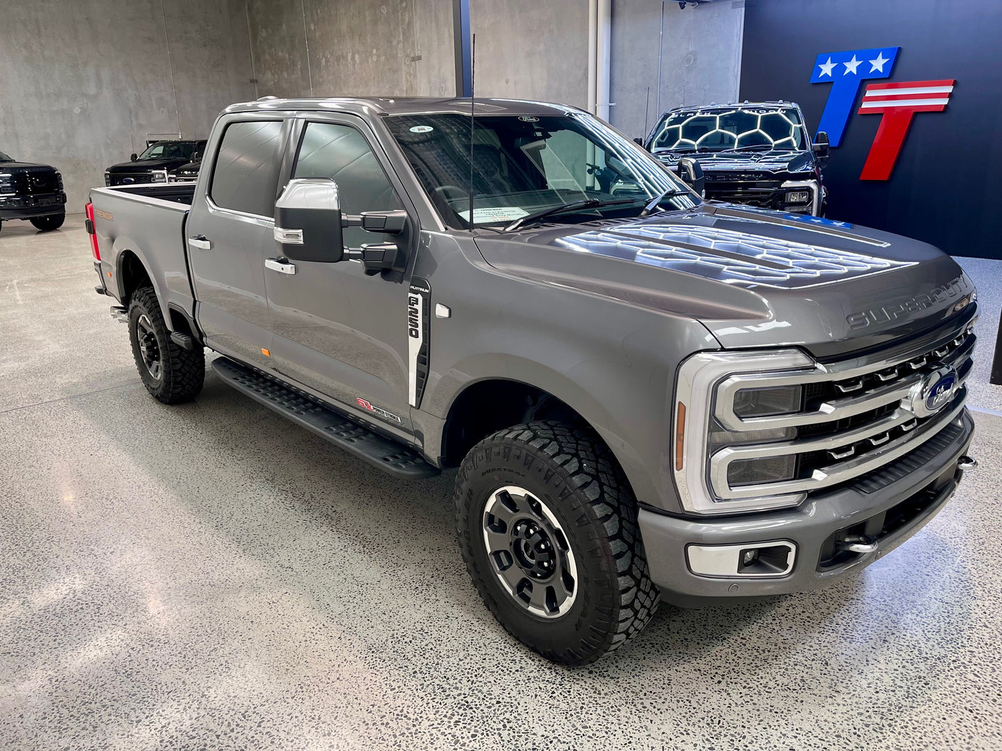 NEW 2024 FORD F250 PLATINUM TREMOR - CARBONIZED GREY (SN# 5082)